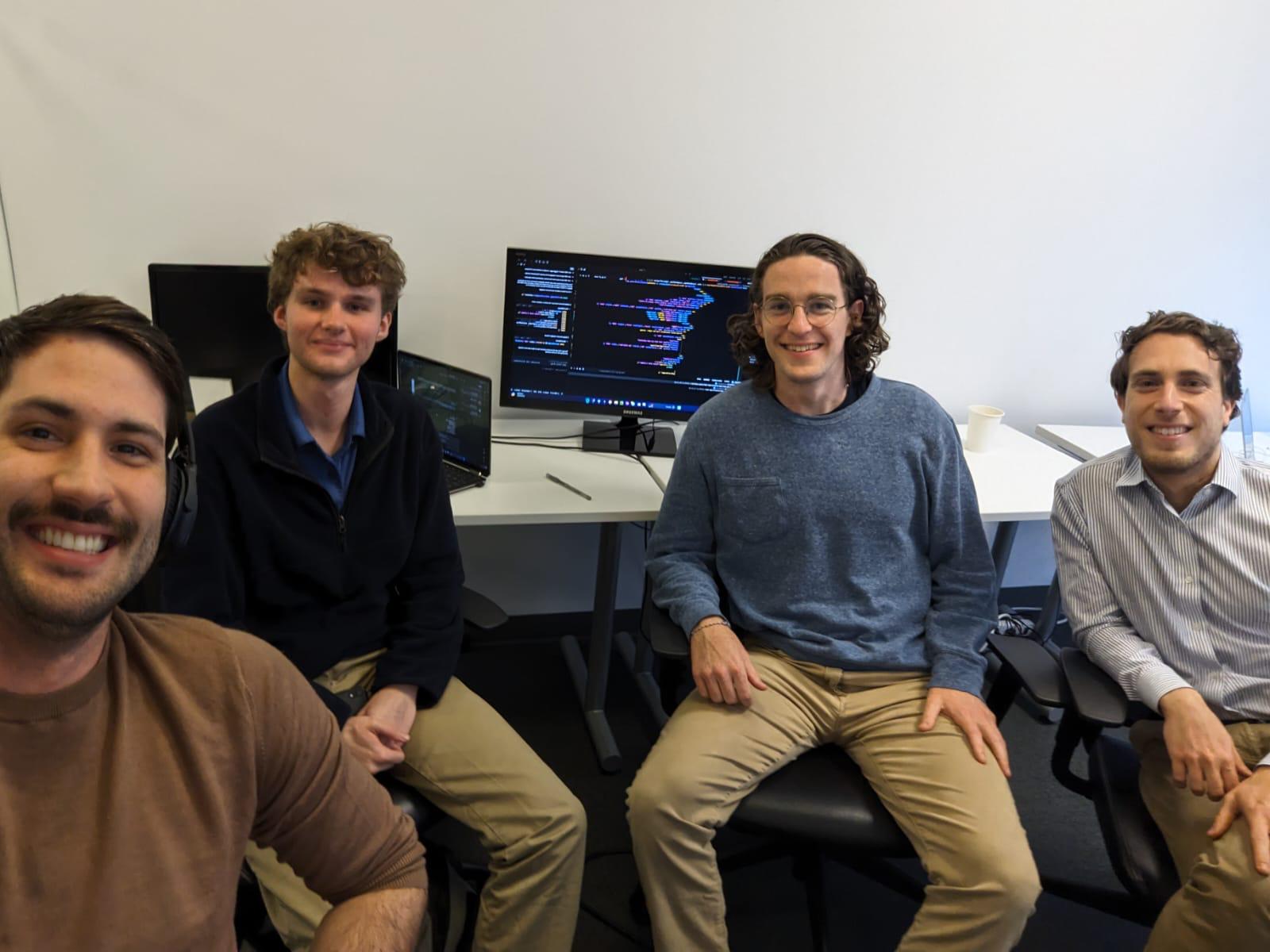 The McCarren team working together in an office.
